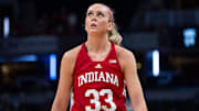 Indiana Hoosiers guard Sydney Parrish (33) looks up at the scoreboard Friday, March 7, 2025, after fouling out against the USC Trojans during the Big Ten women's tournament at Gainbridge Fieldhouse in Indianapolis.