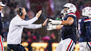 Oct 11, 2025; Tucson, Arizona, USA; Arizona Wildcats head coach Brent Brennan celebrates a blocked field goal during the second quarter of the game against the Brigham Young Cougars at Arizona Stadium. Mandatory Credit: Aryanna Frank-Imagn Images