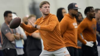 Quarterback Quinn Ewers throws passes to receivers who were participating in Texas Longhorns Football Pro Day at Frank Denius Fields Wednesday March 20, 2024.