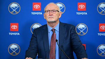 Lindy Ruff talking to the press after the Senators game. 