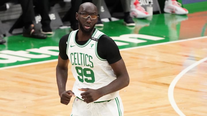 Former Boston Celtics center Tacko Fall (99) returns up court against the Washington Wizards in the third quarter at TD Garden.