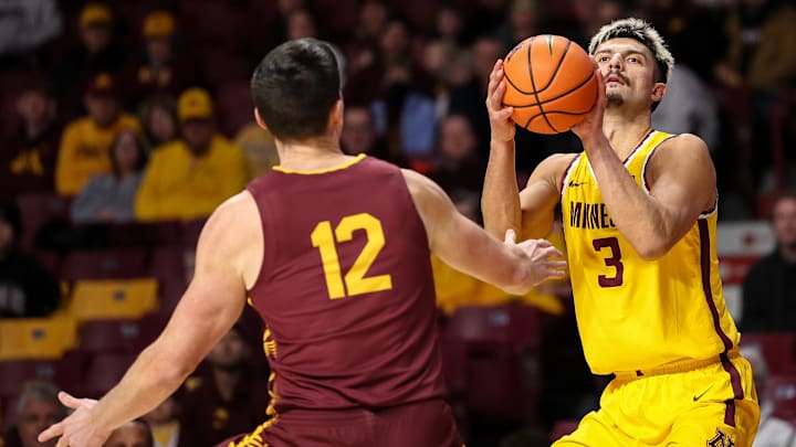 Minnesota Golden Gophers forward Dawson Garcia (3) shoots as Bethune-Cookman Wildcats forward Jesus Carralero Martin (12) defends during the first half at Williams Arena. Minnesota Golden Gophers forward Dawson Garcia (3) shoots as Bethune-Cookman Wildcats forward Jesus Carralero Martin (12) defends during the first half at Williams Arena.