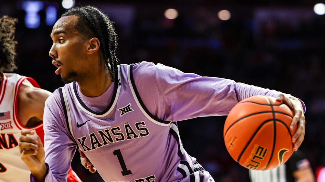 Jan 7, 2026; Tucson, Arizona, USA; Kansas State Wildcats guard Abdi Bashir Jr (1) dribbles the ball during the first half of the game against the Arizona Wildcats at McKale Memorial Center. Mandatory Credit: Aryanna Frank-Imagn Images