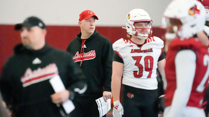 Louisville Football head coach Jeff Brohm looks over his teams during open practice. March 18, 2026