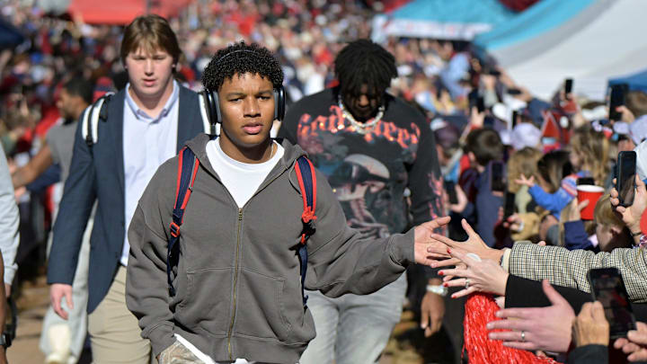 Ole Miss Rebels quarterback Trinidad Chambliss (6) gives high fives on the Walk of Champions before the Ole Miss vs. Tulane College Football Playoff game in Oxford, Miss. on Saturday, December 20, 2025.