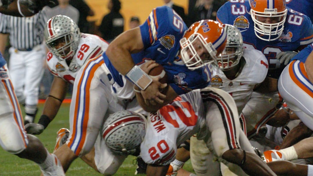BOB SELF/The Times-Union--1/8/07--Florida's Tim Tebow dives over the goal line for a 4th quarter touchdown in the BCS National Championship football game against Ohio State on Jan. 8, 2007, at University of Phoenix Stadium in Glendale, Ariz.

Met 9gatorchampbs010807 Jpg