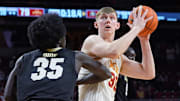 Iowa State Cyclones center JT Rock (30) looks for a shot around Colorado Buffaloes forward Assane Diop (35) during the second half in the Big-12 men’s basketball at Hilton Coliseum on Feb.18, 2025 in Ames, Iowa.