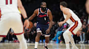 Dec 1, 2025; Miami, Florida, USA; Los Angeles Clippers guard James Harden (1) brings the ball up the court as Miami Heat guard Pelle Larsson, right, defends during the first half at Kaseya Center. Mandatory Credit: Jim Rassol-Imagn Images