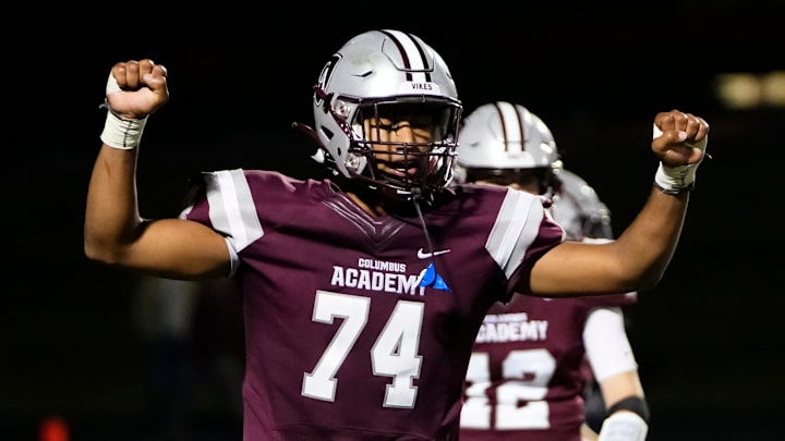 Sep 14, 2023; Gahanna, Ohio, USA; Columbus Academy defensive lineman Reinaldo Perez (74) celebrates the 23-16 win over St. Charles during the high school football game at Columbus Academy.