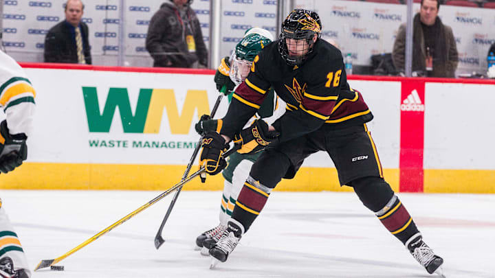 Arizona State University's Max Balinson (26) controls the puck against Clarkson's Jack Jacome (16) during the second period of their game in the 2018 Desert Hockey Classic in Glendale, Friday, Dec. 28, 2018. 

Uscp 73egffoiiw810q6fkj2b Original