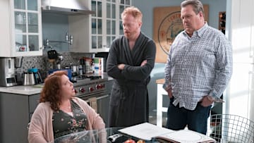 Dana Powell, Jesse Tyler Ferguson, and Eric Stonestreet in Modern Family