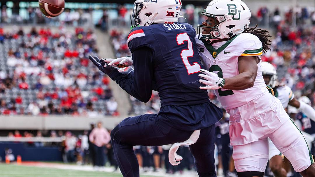 Nov 22, 2025; Tucson, Arizona, USA; Arizona Wildcats defensive back Treydan Stukes (2) intercepts the ball in the end zone during the fourth quarter of the game against the Baylor Bears at Casino Del Sol Stadium. Mandatory Credit: Aryanna Frank-Imagn Images