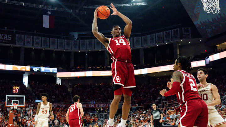 Oklahoma Sooners forward Jalon Moore (14) grabs a defensive rebound in the second half of the Texas Longhorns' game against the Oklahoma Sooners at the Moody Center in Austin, Saturday, March 9, 2024. Texas won the game 94-80.