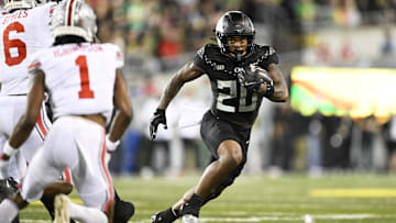 Oct 12, 2024; Eugene, Oregon, USA; Oregon Ducks running back Jordan James (20) runs with the ball during the second half against the Ohio State Buckeyes at Autzen Stadium. Mandatory Credit: Troy Wayrynen-Imagn Images