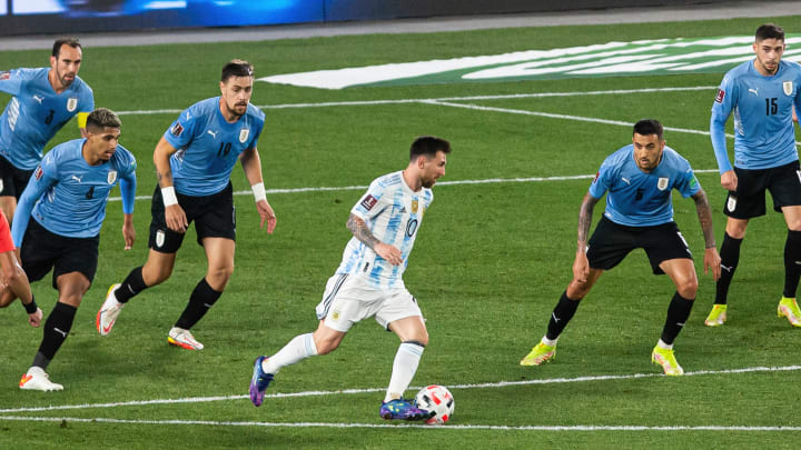 Lionel Messi (center) of Argentina seen in action during the...
