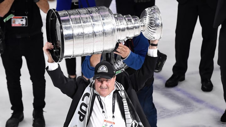 Jul 7, 2021; Tampa, Florida, USA; Tampa Bay Lightning owner Jeff Vinik hoists the Stanley Cup after the Lightning defeated the Montreal Canadiens 1-0 in game five to win the 2021 Stanley Cup Final at Amalie Arena. Mandatory Credit: Douglas DeFelice-USA TODAY Sports