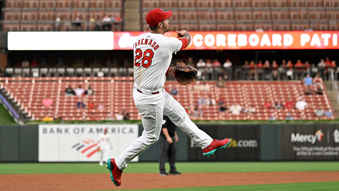 Nolan Arenado makes a jumping throw in a game between the St. Louis Cardinals and Pittsburgh Pirates.