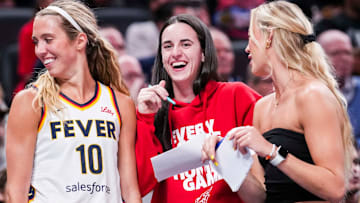 Indiana Fever guard Lexie Hull (10), Indiana Fever guard Caitlin Clark (22), and Indiana Fever guard Sophie Cunningham (8) laugh near the team bench Tuesday, June 3, 2025, during a game between the Indiana Fever and the Washington Mystics at Gainbridge Fieldhouse in Indianapolis.