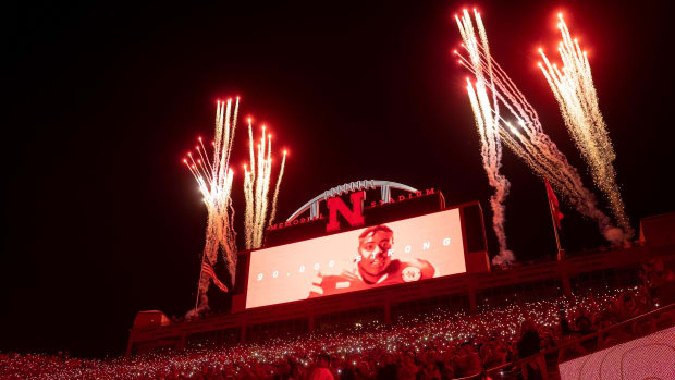 Fireworks go off during a light show at the end of the third quarter at Memorial Stadium.