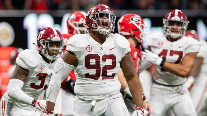 Alabama defensive lineman Quinnen Williams (92) celebrates an Alabama sack during first half action of the SEC Championship Game at Mercedes Benz Stadium in Atlanta, Ga., on Saturday December 1, 2018. 

Sec35