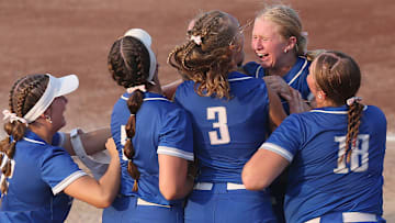 Van Meter softball team celebrates the 2A Iowa high school state softball championship at Rogers Sports complex on Friday, July 26, 2024, in Fort Dodge, Iowa.