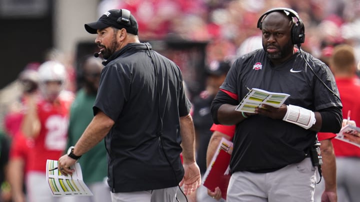 Sep 16, 2023; Columbus, Ohio, USA; Ohio State Buckeyes head coach Ryan Day and running backs coach Tony Alford watch from the sideline during the NCAA football game against the Western Kentucky Hilltoppers at Ohio Stadium. Ohio State won 63-10.