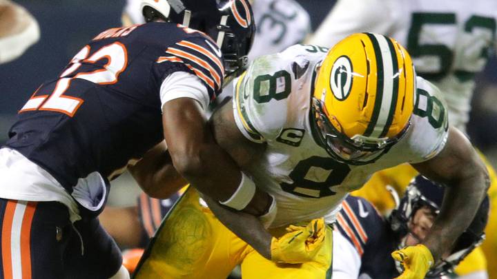 Chicago Bears safety Elijah Hicks (22) punches the ball loose from Green Bay Packers running back Josh Jacobs (8) during their wild-card playoff football game Saturday, January 10, 2026, at Soldier Field in Chicago, Illinois. The Bears defeated the Packers 31-27.
Wm. Glasheen /USA TODAY NETWORK-Wisconsin.