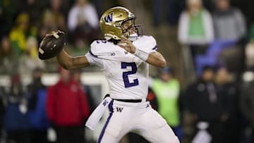 Nov 30, 2024; Eugene, Oregon, USA; Washington Huskies quarterback Demond Williams Jr. (2) throws a pass during the first half against the Oregon Ducks at Autzen Stadium. Mandatory Credit: Troy Wayrynen-Imagn Images