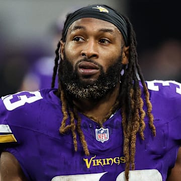 Dec 8, 2024; Minneapolis, Minnesota, USA; Minnesota Vikings running back Aaron Jones (33) looks on during the fourth quarter against the Atlanta Falcons at U.S. Bank Stadium.