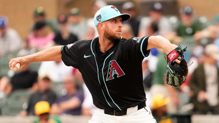 Arizona Diamondbacks starting pitcher Merrill Kelly throws to the Oakland A  s in the first inning