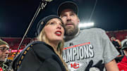 February 7, 2025: Taylor Swift, left, and Kansas City Chiefs tight end Travis Kelce walk off the field after the trophy ceremony following the Chiefs 32-29 victory over the Buffalo Bills in the AFC Championship Game on Jan. 26, 2025, at GEHA Field at Arrowhead Stadium in Kansas City, Missouri. 