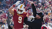 Iowa State Cyclones' wide receiver  (9) celebrates with  after score a touchdown against Kansas during the third quarter in the senior day on Nov. 22, 2025, at Jack Trice Stadium in Ames, Iowa