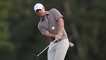 Rory McIlroy hits a chip shot during the first round of the 2025 Masters at Augusta National