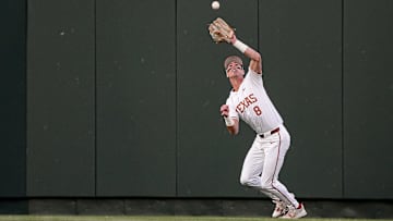 Texas Longhorns outfielder Will Gasparino (8) catches a fly ball during the game against LSU at UFCU Disch-Falk Field on Friday, March. 21, 2025.