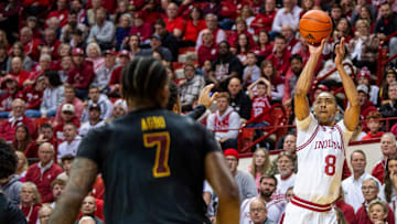 Indiana's Bryson Tucker (8) shoots over USC's Chibuzo Agbo in January.
