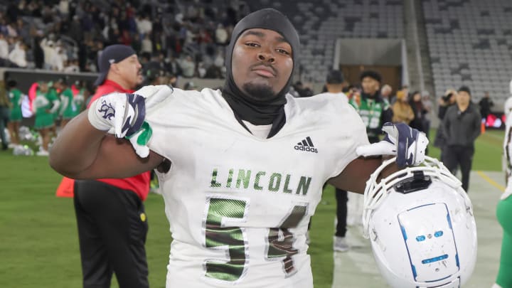 Lincoln's Eugene Rice celebrates after winning the 2022 San Diego Section Open Division championship