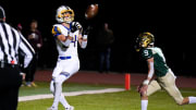 Olentangy   s Kaden Gebhardt (34) catches a touchdown pass while Dublin Jerome   s Patrick Nally (9) defends during a first-round Division I playoff game Oct. 28.

High School Cep Hsfb Playoffs Olentangy At Dublin Jerome