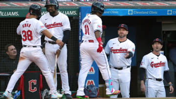 Guardians manager Stephen Vogt congratulates José Ramírez (11) after his two-run homer during the fifth inning of the home opener against the Chicago White Sox, Monday, April 8, 2024.