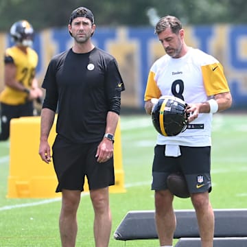 Jun 10, 2025; Pittsburgh, PA, USA;  Pittsburgh Steelers quarterback Aaron Rodgers (8) puts on his helmet during minicamp at their South Side facility. Mandatory Credit: Philip G. Pavely-Imagn Images