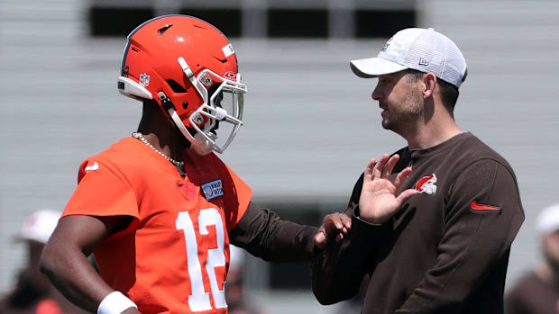 Cleveland Browns quarterback Shedeur Sanders (12) works with offensive coordinator Tommy Rees during NFL rookie minicamp at t