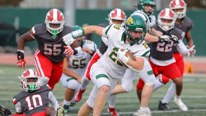 Sonora running back Tommy Sutton runs against St. Pius in the CIF State Division 4A final at Veterans Stadium in Long Beach, Calif. on December 14, 2024. Sonora running back Tommy Sutton runs against St. Pius in the CIF State Division 4A final at Veterans Stadium in Long Beach, Calif. on December 14, 2024.