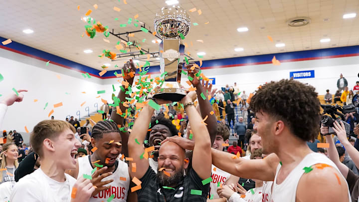 Columbus head coach Andrew Moran proudly hoists the trophy surrounded by his player after winning the 2025 Chipotle Nationals championship in Indiana. Columbus head coach Andrew Moran proudly hoists the trophy surrounded by his player after winning the 2025 Chipotle Nationals championship in Indiana.