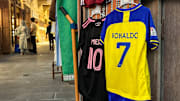 QATAR-FBL-MESSI-RONALDO