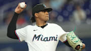 Aug 25, 2025; Miami, Florida, USA;  Miami Marlins starting pitcher Edward Cabrera (27) pitches in the first inning against the Atlanta Braves at loanDepot Park. Mandatory Credit: Jim Rassol-Imagn Images