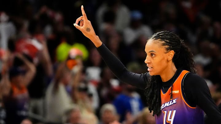 Phoenix Mercury forward DeWanna Bonner (14) reacts after making a jumper shot against the New York Liberty late in the fourth quarter during Game Three of the 2025 WNBA Playoffs first round at PHX Arena on Sept. 19, 2025, in Phoenix. Phoenix Mercury forward DeWanna Bonner (14) reacts after making a jumper shot against the New York Liberty late in the fourth quarter during Game Three of the 2025 WNBA Playoffs first round at PHX Arena on Sept. 19, 2025, in Phoenix.