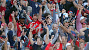 Cleveland Guardians fans go wild after shortstop Brayan Rocchio (4) solo homer during the eighth inning of Game 2 of the American League wild card series at Progressive Field, Oct. 1, 2025, in Cleveland, Ohio.