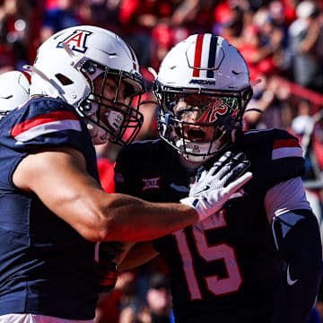 Nov 8, 2025; Tucson, Arizona, USA; Arizona Wildcats tight end Sam Olson (84) celebrates a touchdown pass during the first quarter of the game against the Kansas Jayhawks at Arizona Stadium. Mandatory Credit: Aryanna Frank-Imagn Images