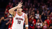 Nov 11, 2025; Tucson, Arizona, USA;  Arizona Wildcats forward Koa Peat (10) scores a three pointer during the first half of the game against the Northern Arizona Lumberjacks at McKale Memorial Center. Mandatory Credit: Aryanna Frank-Imagn Images
