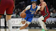 Nov 24, 2025; Miami, Florida, USA; Dallas Mavericks forward Cooper Flagg (32) drives to the basket