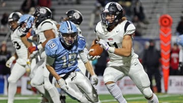 Nate Malarkey of Dallas is in pursuit of the ballcarrier for Aliquippa in the 2023 PIAA Class 4A state championship game. 